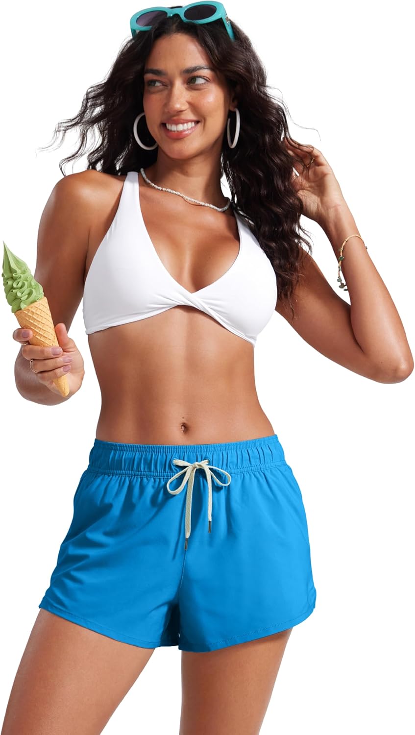 CRZ YOGA Donna 3” Vita Media Nuoto Pantaloncini Spacchetti Laterali Costume da Bagno Asciugatura Rapida con Fodera Tasche